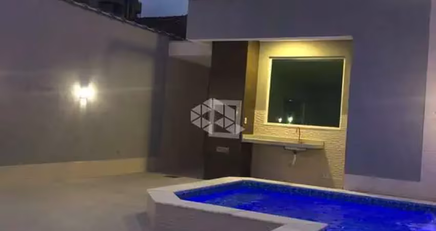 Sobrado com 3 suites e piscina privativa na vila tupi - praia grande sp