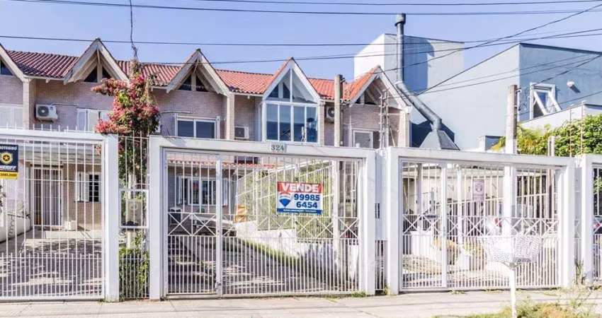 Casa à venda em Porto Alegre-RS, Guarujá: 2 quartos, 2 suítes, 3 banheiros, 2 vagas de garagem, 78m². Confira!