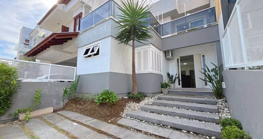 Espetacular casa à venda na Hípica, Porto Alegre-RS: 1 quarto, 3 suítes, 4 banheiros, 2 vagas de garagem, 210m².
