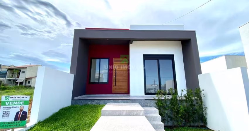 Casa térrea nova com 3 dormitórios sendo 1 suíte, living 2 ambientes, área de serviço fechada, banheiro social, pé direito auto, piso porcelanato de a