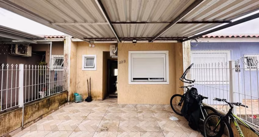Casa à venda na Restinga, Porto Alegre-RS: 2 quartos, sala, banheiro, garagem e 48m² de área. Imperdível oportunidade!