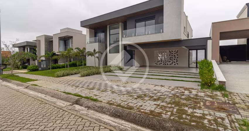 Maravilhosa casa de 530m² no Urbanova Cond Reserva do Paratehy Norte, com sala 3 ambientes, 4 suítes amplas, cozinha integrada e área gourmet codigo: 111098