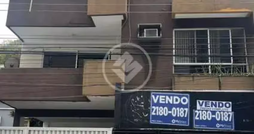 Prédio misto com dois apartamentos + loja no coração da praia da costa. codigo: 89662