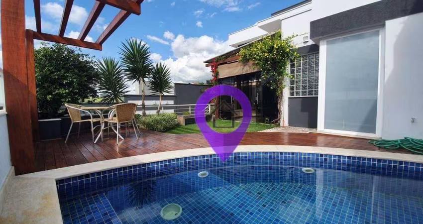 Casa de 340m² à venda no bairro Pousada dos Campos em Pouso Alegre. 4 suítes, piscina com deck e acabamento em alto padrão