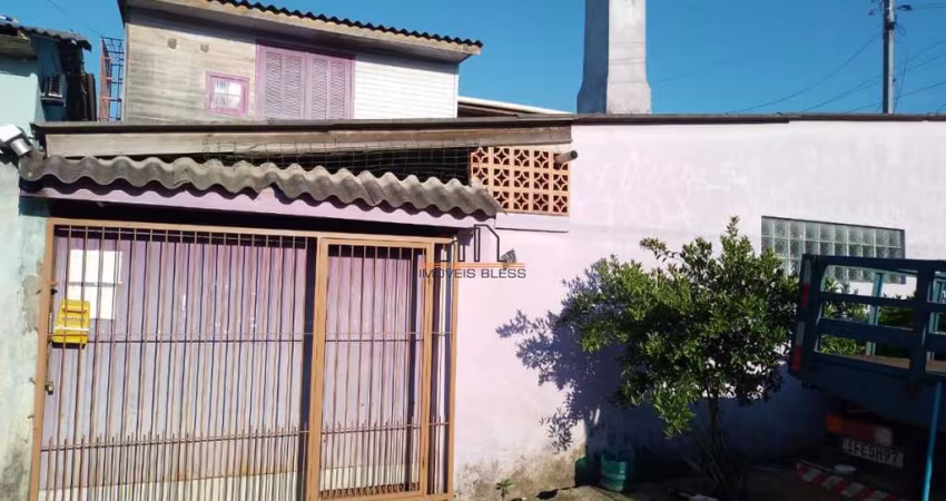 Casa localizada no bairro Guajuviras/Canoas