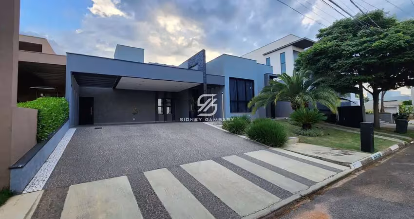 Casa térrea com 4 suítes e ampla área de lazer no condomínio Fazenda Imperial.