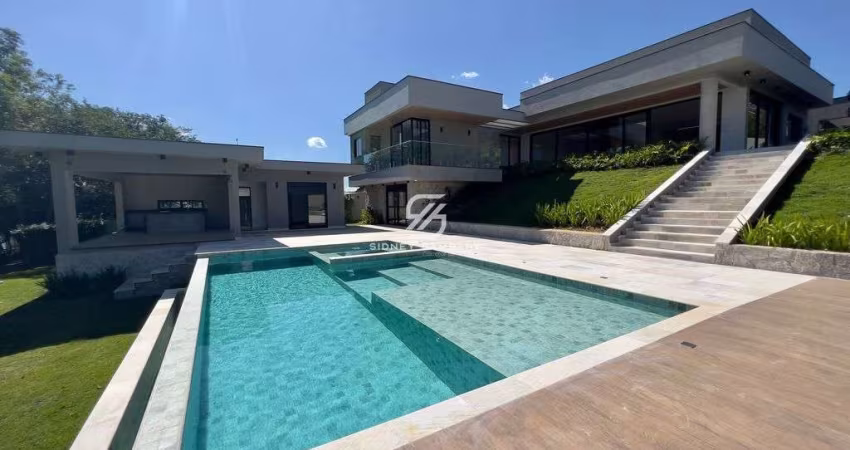 Casa com 4 suítes, lote de 1711m² com fundo para o lago no Village Ipanema 1