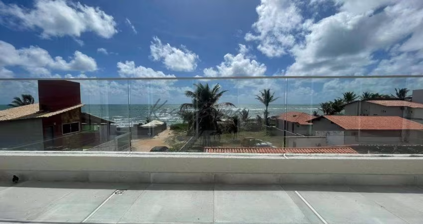 Casas conectadas de frente para o mar na Praia de Tabatinga
