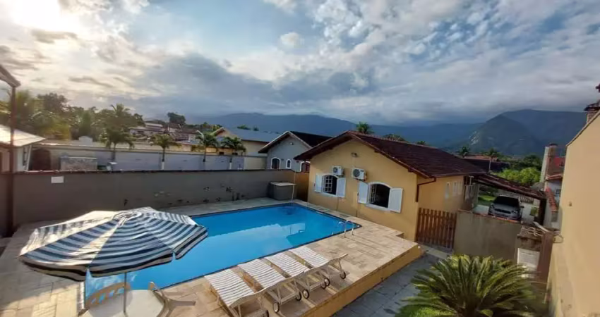 Viva o sonho na praia: casa à venda em Morada da Praia, Bertioga/SP - 3 quartos, piscina, área gourmet e muito mais!