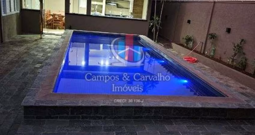 Residência elegante com estruturas funcionais e área de lazer completa.