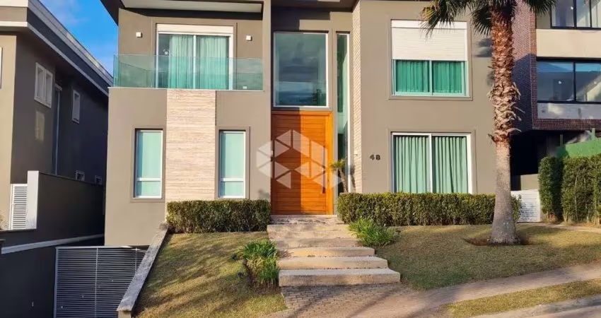 Casa em condomínio fechado com 4 suítes à venda, 525 metros e 4 vagas - tamboré 10 - alphaville, são paulo/sp