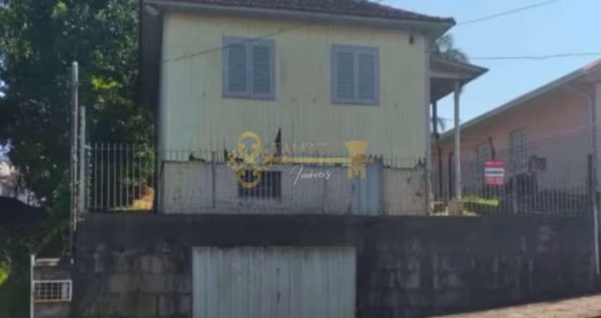 Terreno com casa