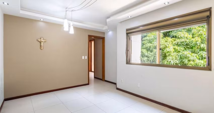 Apartamento com 2 dormitórios (1 suíte) e 1 vaga de garagem no Bairro Bela Vista