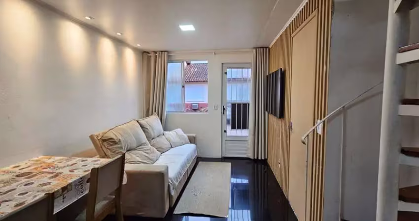 Casa em condomínio com 02 dormitórios com garagem no bairro parque santa  fé
