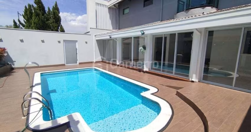 Casa com 4 dormitórios, sendo 3 suítes, à venda, 372 m² por R$ 2.690.000 - Loteamento Residencial J
