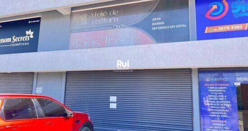 Loja para aluguel em Hípica, Porto Alegre - Piso frio, porcelanato, mezanino, fechada com vidro e cortina de ferro automatizada