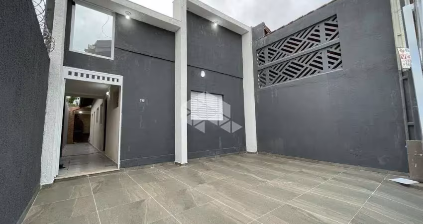 Casa nova a venda na praia grande, no bairro caiçara, com 2 quartos, 2 suítes e 2 vagas