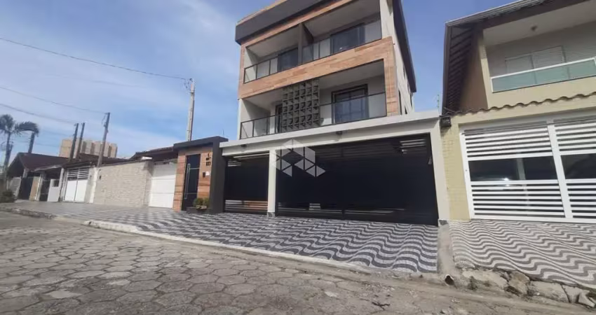 Sobrado em condomínio á venda em vila mirim,  praia grande com 2 quartos e 1 vaga