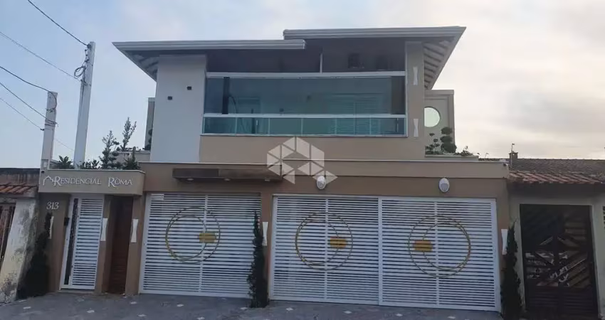 Sobrado em condominio a venda na praia grande, bairro caiçara, com 2 quartos e 1 vaga