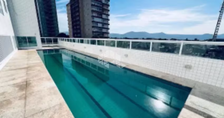 Apartamento a venda na praia grande, bairro aviação, com 1 quarto, 1 suite e 1 vaga