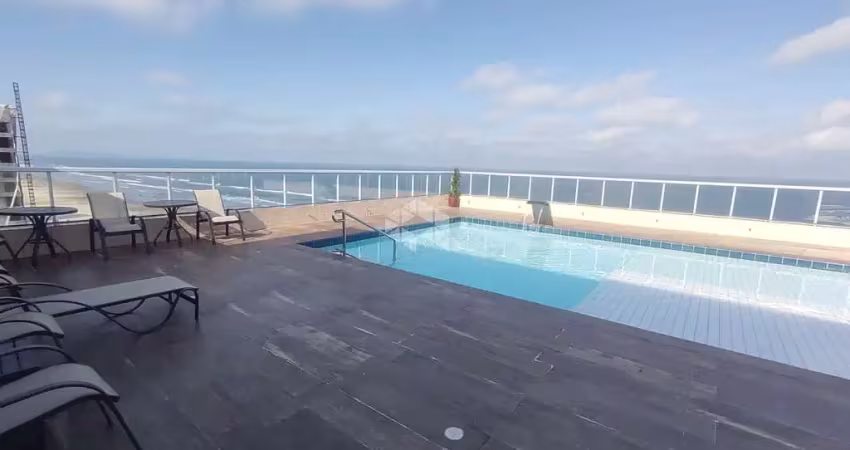 Apartamento a venda na praia grande, bairro real, com 2 quartos, 1 suite e 1 vaga
