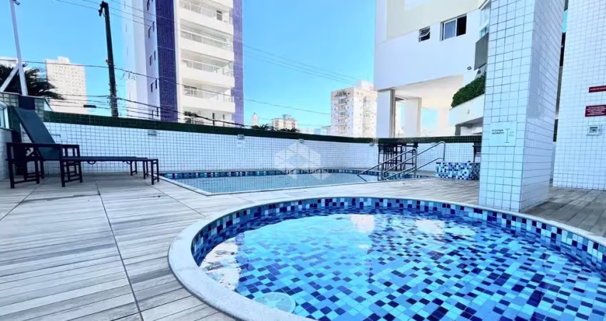 Apartamento a venda em praia grande, guilhermina, com 1 quarto com sacada e 1 vaga