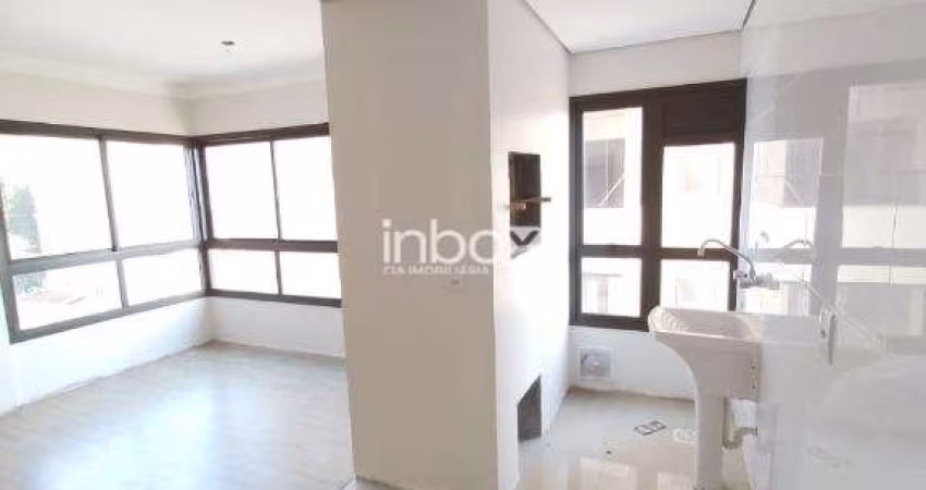 INBOX CIA IMOBILIÁRIA ALUGA - Apartamento de dois quartos com um box de garagem no bairro no Centro.