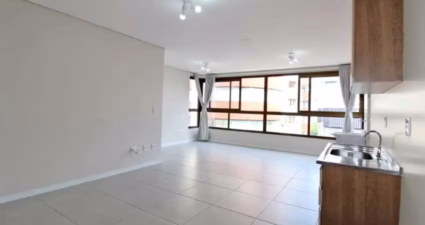 Inbox cia imobiliária aluga - apartamento studio com um box de garagem no centro de bento gonçalves.