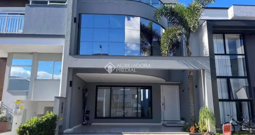 Casa em condomínio fechado com 4 quartos à venda na Avenida Deltaville, 150, Beira Rio, Biguaçu