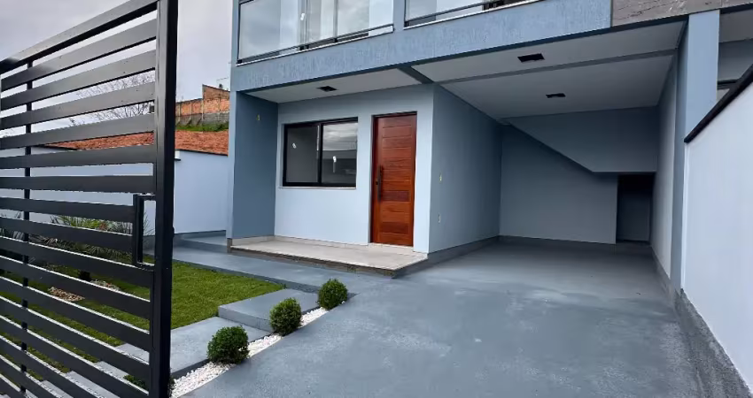Sobrado com 3 quartos sendo 1 suíte garagem coberta