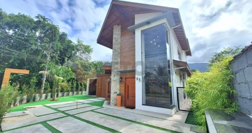 Sobrado com 3 dormitórios à venda, 220 m² por R$ 2.200.000,00 - Massaguaçu - Caraguatatuba/SP