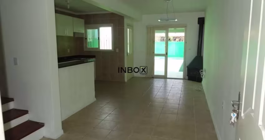 Casa com 3 quartos à venda na Rua Claudio da Silva Pinto, 277, Guarujá, Porto Alegre