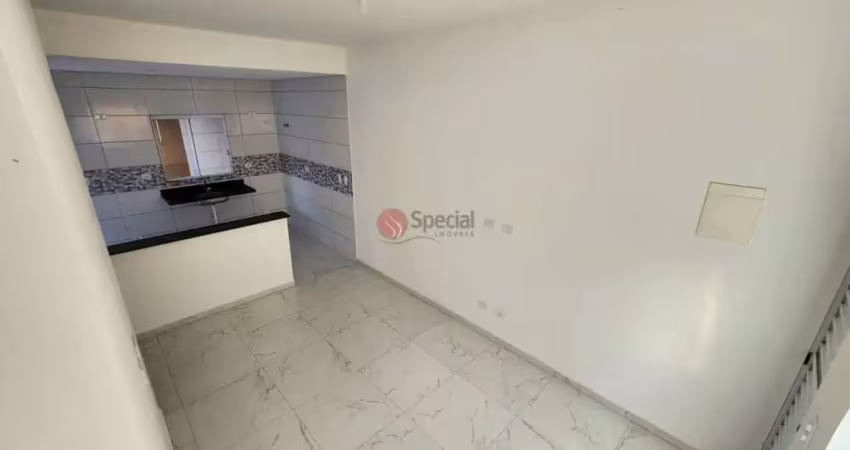Casa de condomínio com 63 metros em caiçara praia grande, com 2 quartos, 1 vaga de garagem.