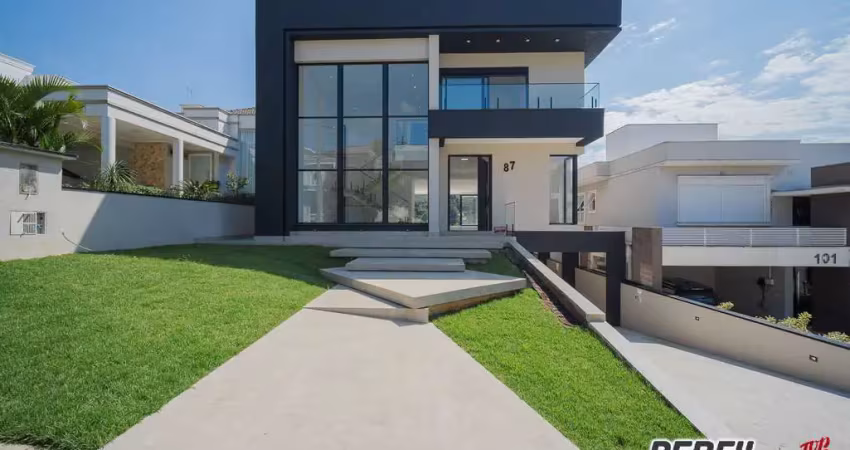 Vendo - casa de condominio - alto padrão – 4 suítes - 10 vagas.