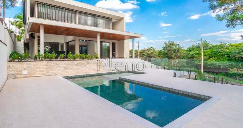 Casa à venda com 4 suítes no residencial jatibela, campinas.
