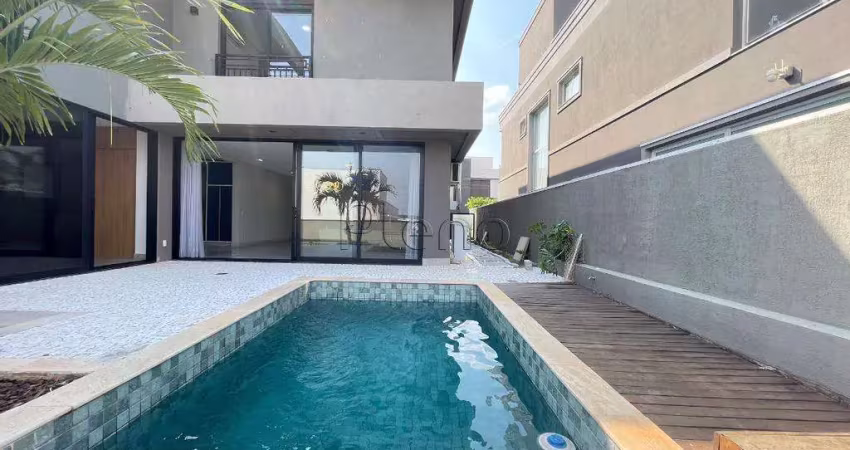 Sobrado à venda em campinas, loteamento parque dos alecrins, com 4 suítes, com 303 m²