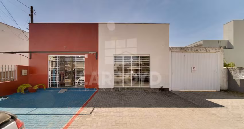 CASA MISTA COM SALAS COMERCIAIS E EDÍCULA