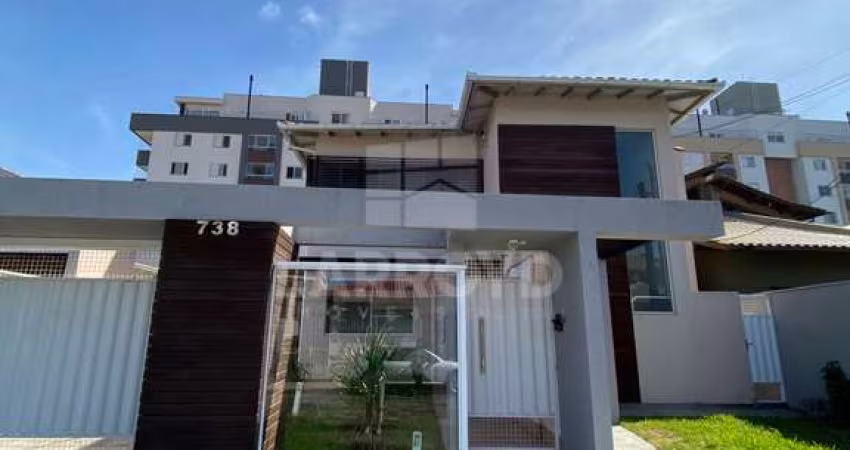 CASA COM SALA COMERCIAL EM ALVENARIA