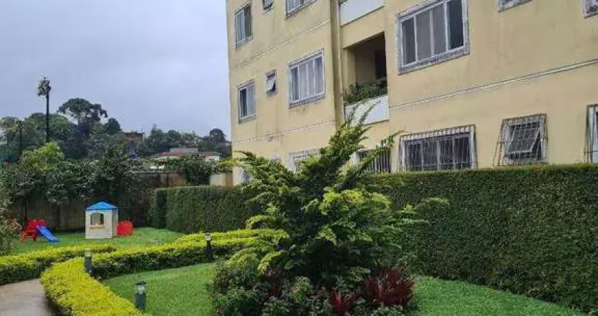 Apartamento térreo,  2 quartos (1 suíte), sala, banheiro social, cozinha, área de serviço ampla e garagem.