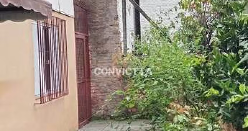 TERRENO COM DUAS CASAS PARA VENDA CENTRO