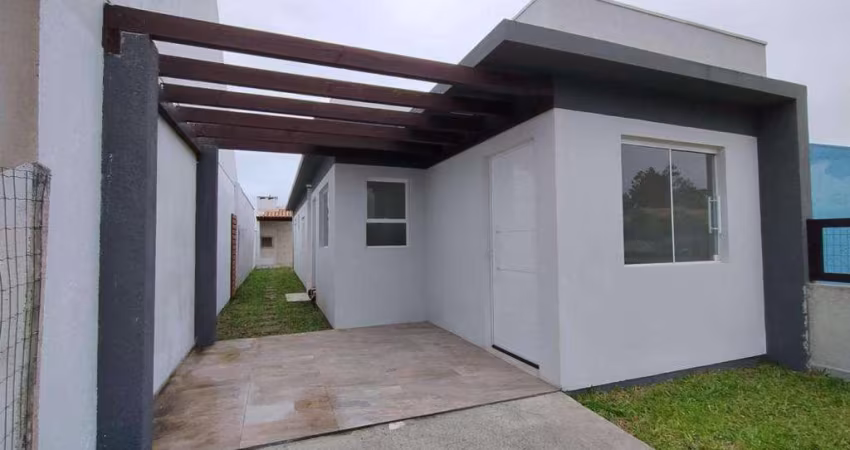 Casa 2 Dormitórios à venda no Bairro VILLAGE - 2 vagas de garagem