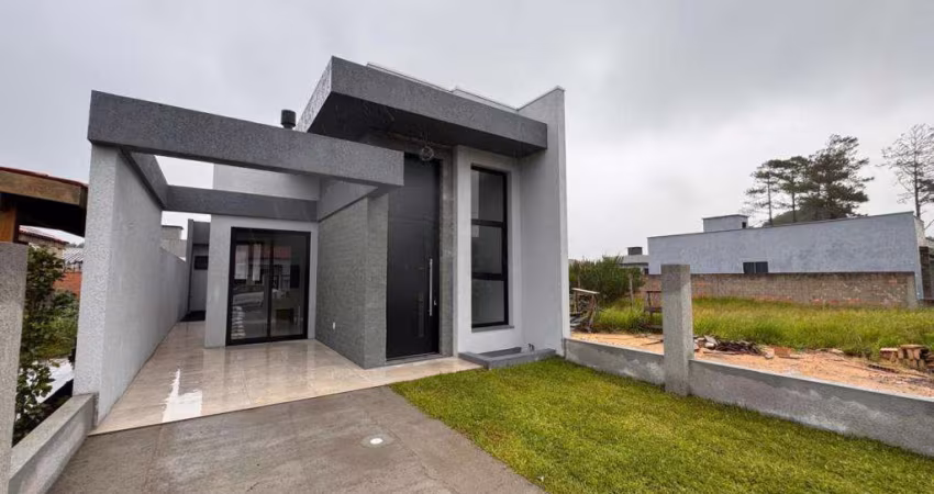 Casa 3 Dormitórios à venda no Bairro VILLAGE - 2 vagas de garagem