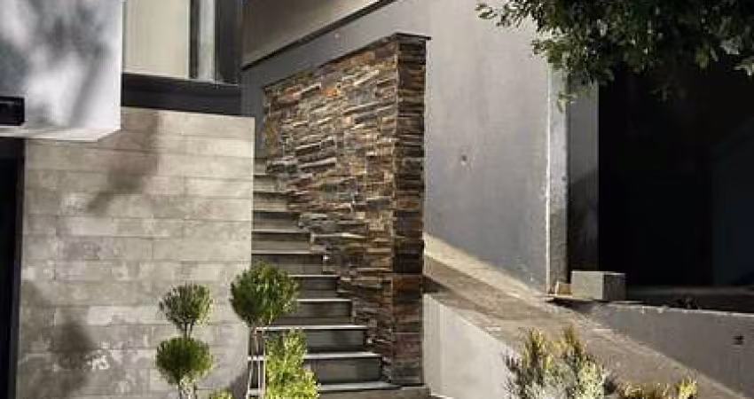 Casa moderna e sofisticada com área gourmet e jardim iluminado. Tremembé-SP
