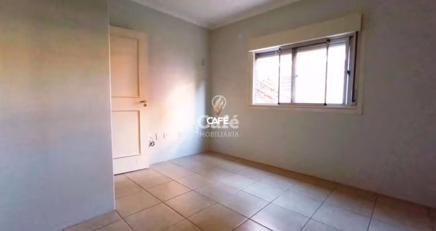 Apto 2 dormitórios, sala, cozinha, área de serviço e garagem