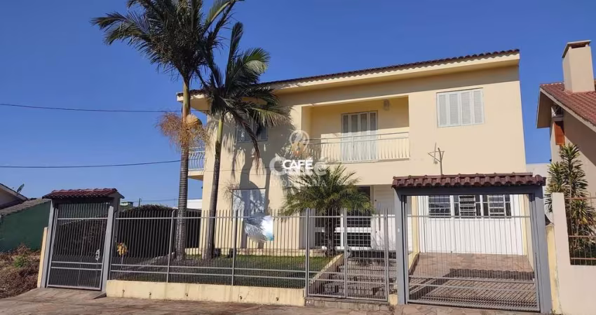 Ampla casa com 6 dormitórios, sendo 2 suítes, pátio e 2 garagens - Camobi, Santa