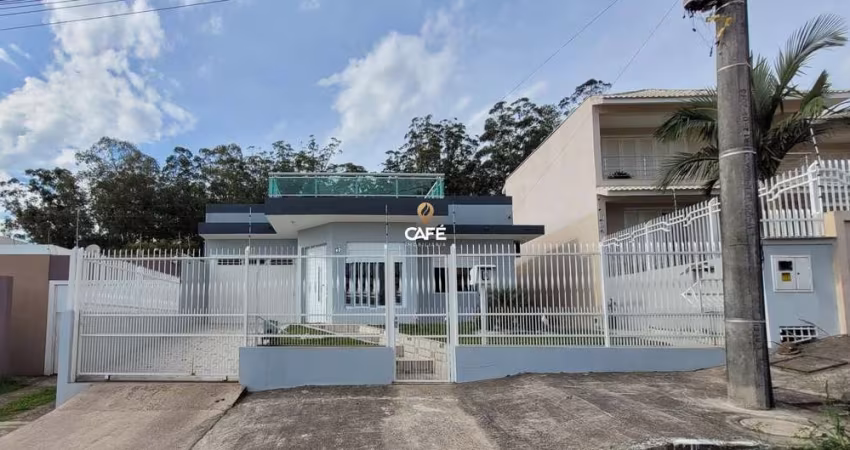 Linda casa de 4 dormitórios, suíte e 2 vagas de garagem!