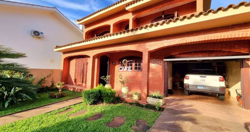 Excelente casa de 3 dormitórios localizada no Bairro Duque de Caxias