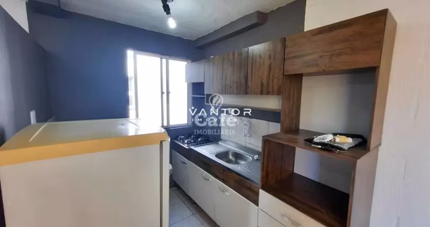 Apartamento de 2 dormitórios com vaga de estacionamento.