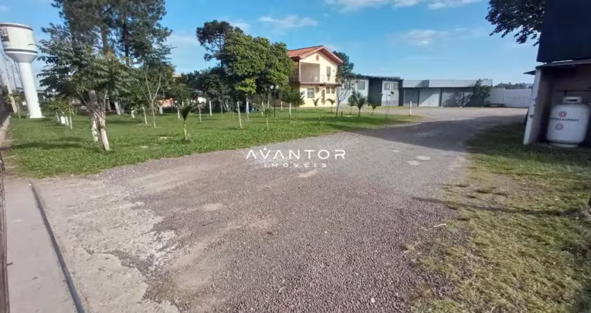 Terreno amplo de 3.800 m² com casa, pavilhão e galpão, para alugar na br 158.