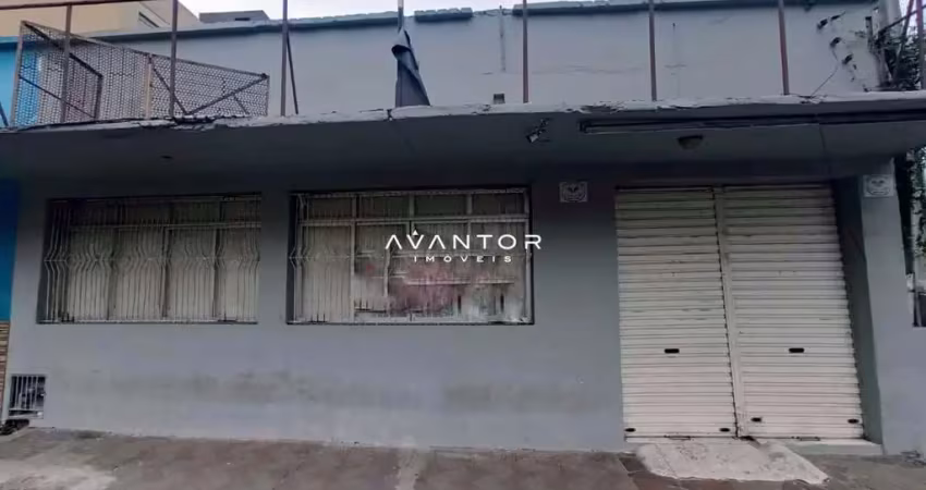 Sala comercial ampla de 90 m² com banheiro em ótima localização.